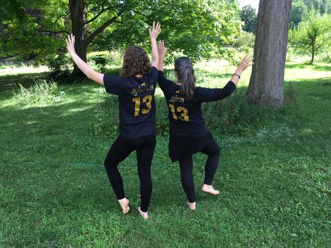 Gina and ajanta dancing in the backyard
