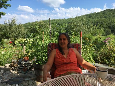 Gina in her natural habitat surrounded by tomato plants