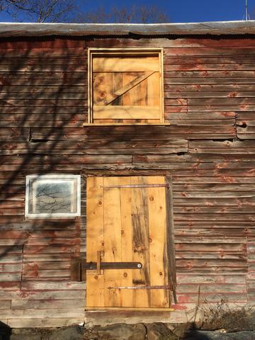 Rebuilt doors on the barn